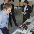 Obr. 2 Zástupcovia spoločnosti HUMUSOFT, spol. s r.o., Michal Blaho ( vľavo ) a Ing. Martin Foltin, PhD., demonštrovali aj praktickými ukážkami možnosti pripojenia platformy Arduino s MATLAB-om
