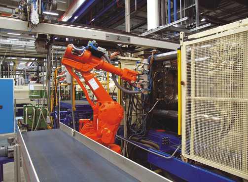 Použitie robotov v automobilovom priemysle pri výrobe zadných reflektorov
