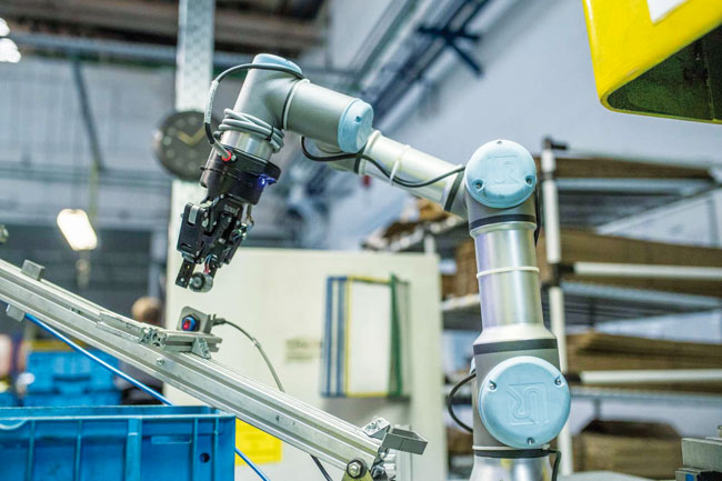Vysoká konkurencieschopnosť v assa abloy vďaka kolaboratívnym robotom - ilustrac3